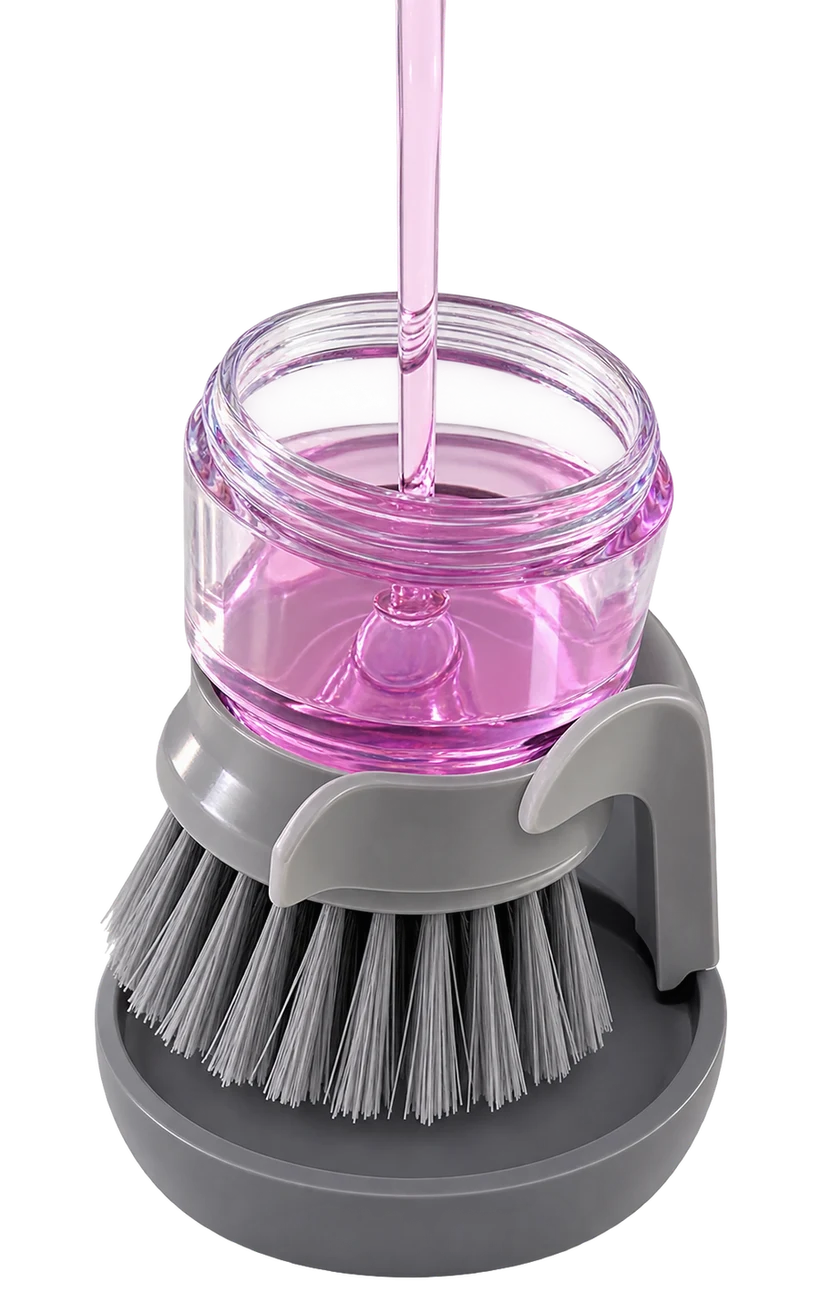 Jalenza dish brush being filled with dish soap