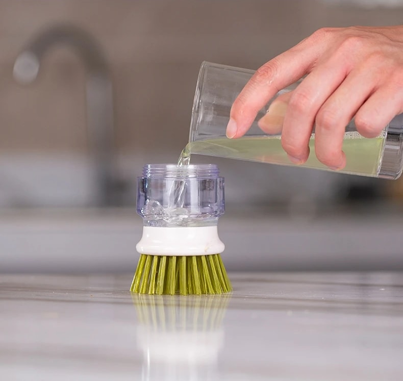 Pouring dish soap into the Jalenza brush